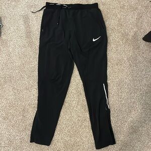 Nike black running pants. Dri-Fit. Barely used.